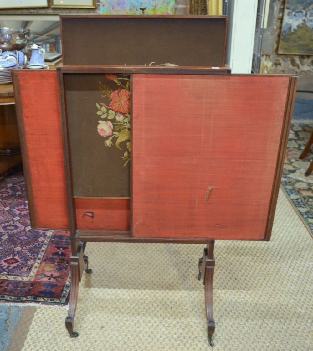 A Victorian mahogany triple panel rise a