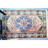 An antique Persian Brojerd rug, 159 x 90