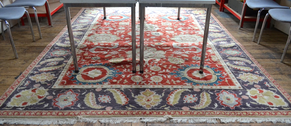 An Indian Agra carpet with large rosette