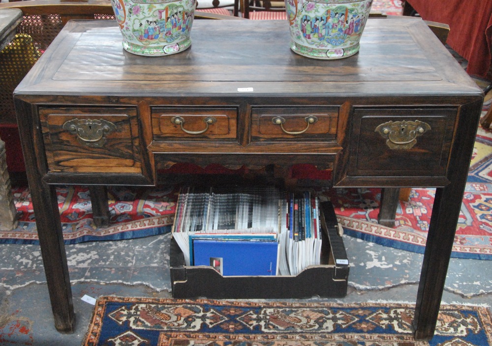 An antique Chinese calamander desk, the