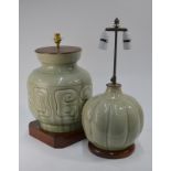 Two pale celadon oviform vases in the Chinese style, both mounted for electricity,