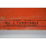 A Hornby O Guage Turntable in its original orange box, marked 'Hornby Trains/No.