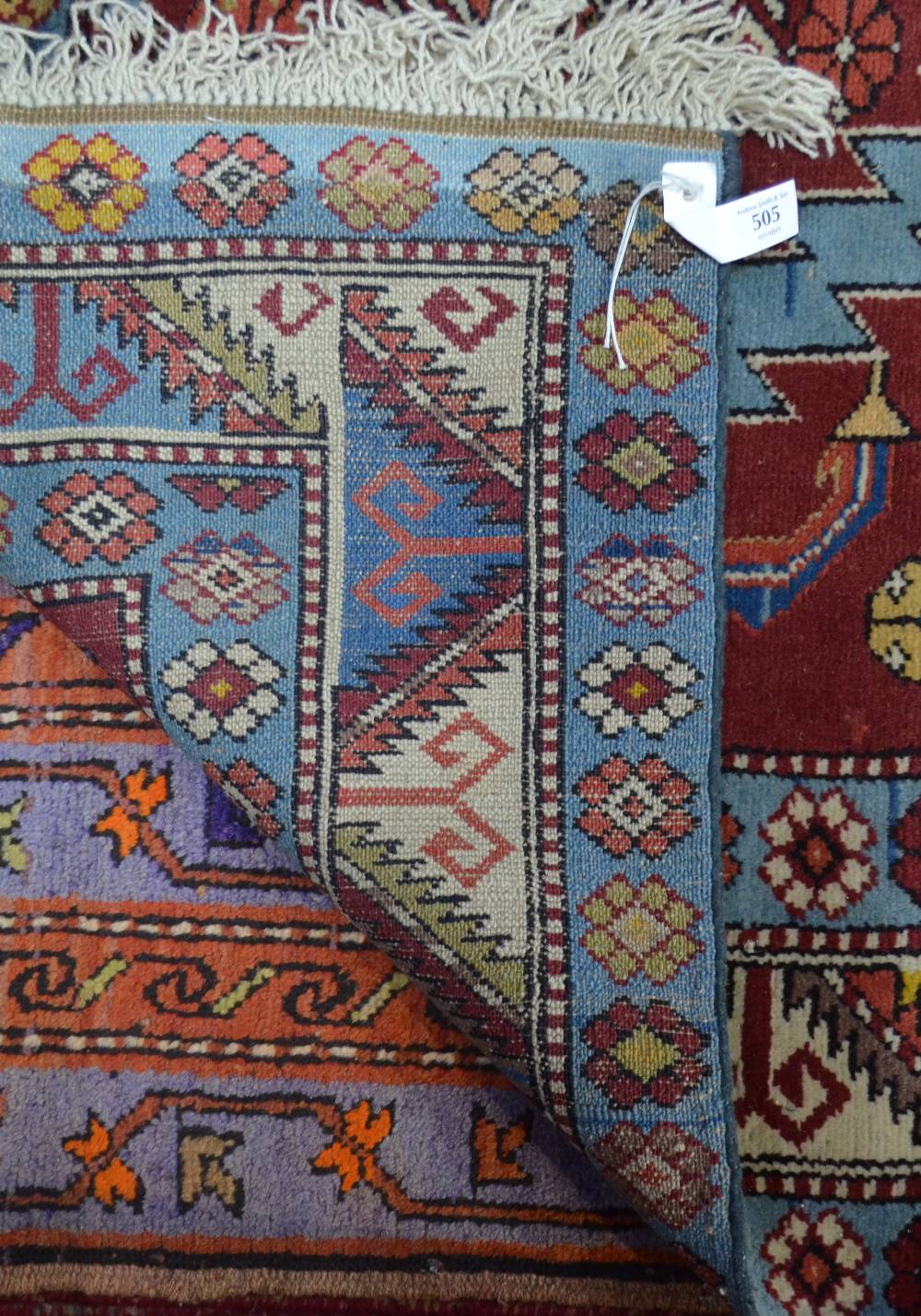 WITHDRAWN An old Anatolian Kuba triple pole design rug, on blue ground, - Image 3 of 3