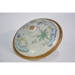 An elegant famille rose tureen cover of circular form with knop finial, decorated with an elegant