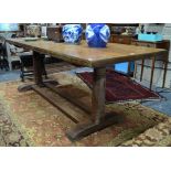 An antique oak refectory table in the manner of Robert 'Mouseman' Thompson by Hamptons, Pall Mall