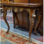 A late 18th century burr walnut and walnut card table, the fold-over top with lobed corners