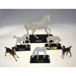 Four white Beswick matt horses on plinths - Spirit of the Wind, no 2688, Young Spirit, Springtime