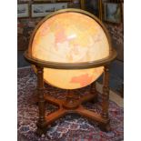 Le Roy Tolman, a large 32" illuminated library globe on oak stand, by Replogle Globes, USA,