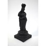 A 19th century Wedgwood basalt stoneware classical allegorical figure of Plenty on waisted socle and