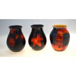 Three Poole Pottery vases comprising a 'Galaxy' vase, 16.5 cm high, 'Gemstone' vase, 16 cm high