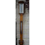 J. H. Steward, London, a 19th century oak stick barometer with ivorine thermometer - register