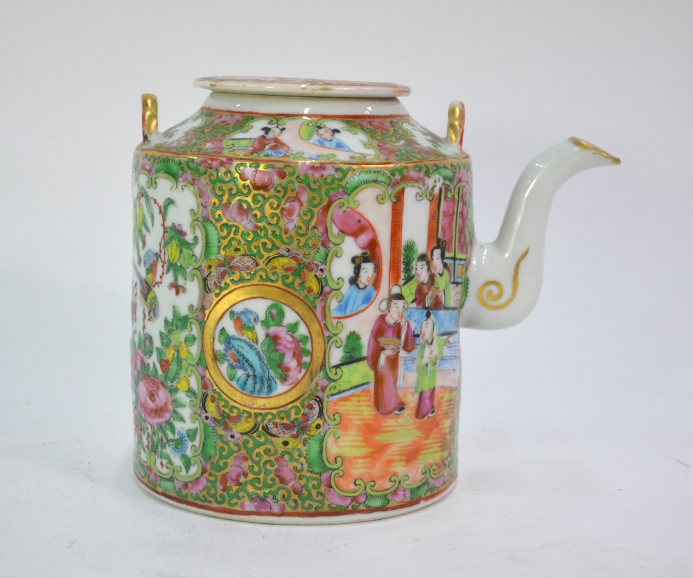 A Canton famille rose teapot of cylindrical form, decorated with typical panels of Natural History