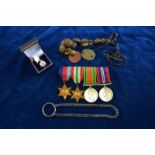 A group of four WWII campaign medals comprising 1939-45 star; Italy star; Defence Medal; War