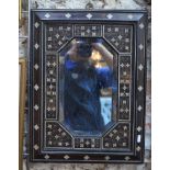 An Indian bone-inlaid hardwood easel mirror with bevelled plate and foliate decoration, adjustable