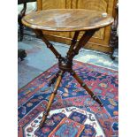 A Victorian walnut gypsy table, the circular top over turned and moulded supports, 64 cm diam x 52