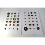 An interesting collection of vintage buttons presented on ten cardboard sheets, each displaying