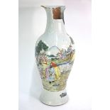 A famille rose vase, decorated with a narrative scene of scholars in a landscape, possibly from