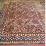 An old Esari Turkoman rug, N Afghanistan, the two rows of guls on mid red ground circa 1910, 204 x