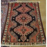 A handmade Persian Hamadan rug, 140 x 100 cm
