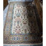 An old Persian Tabriz rug, camel ground, stylised floral deisng, 194 x 138 cm