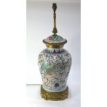 A wucai oviform vase, decorated in underglaze blue, aubergine, yellow, orange and green with a