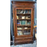 A 19th century Continental mahogany library bookcase, the moulded cornice over a single glazed