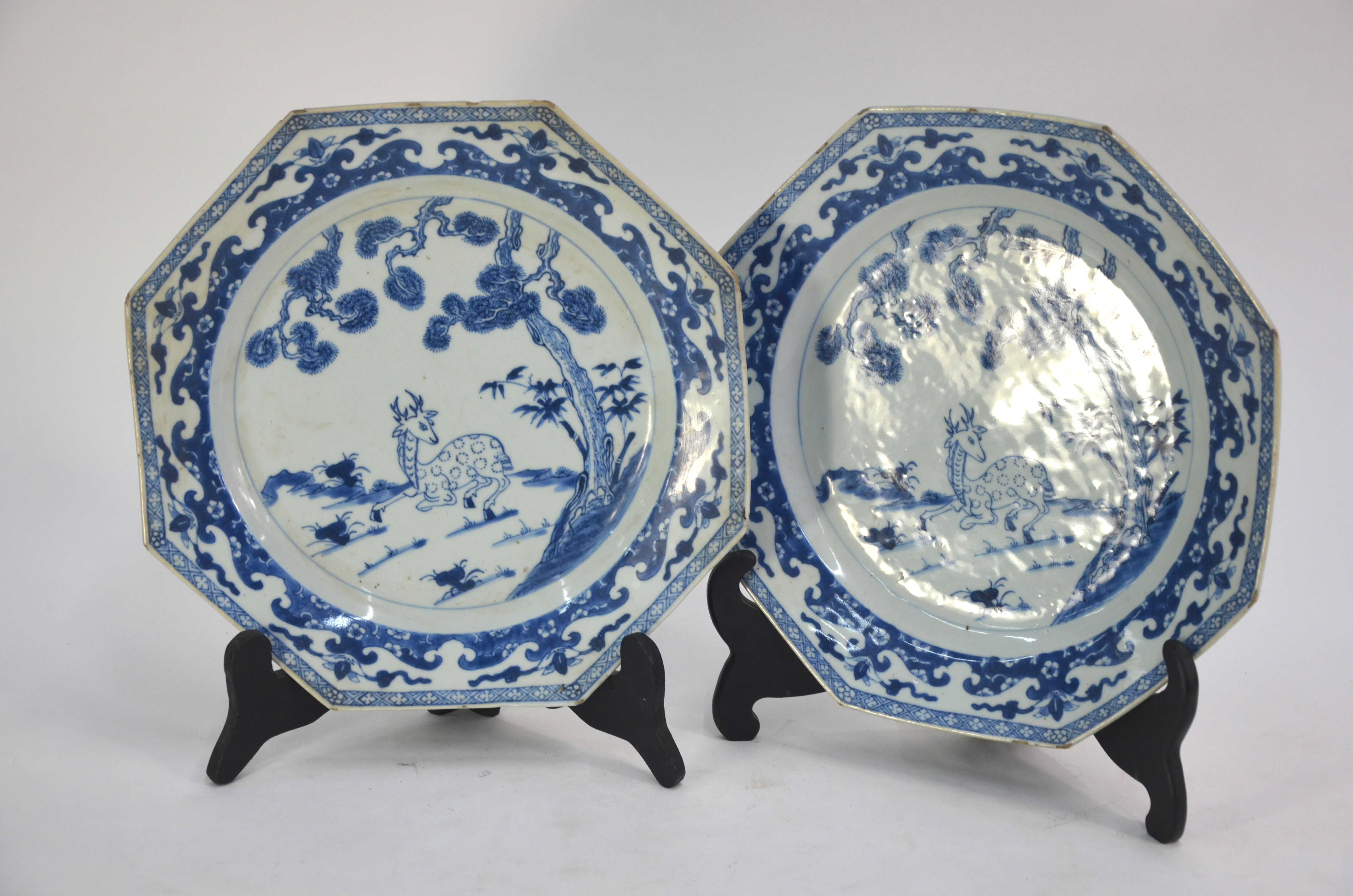 An associated pair of Chinese Export, blue and white dishes; each one of octagonal form, decorated