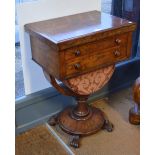 A Victorian rosewood combination work/writing table, the hinge over top revealing a blue leather