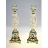 A pair of Victorian Minton classical style candlesticks, the stems in the form of three parian