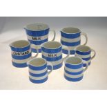 Seven T G Green Blue Cornish Ware jugs including a 1 One Quart milk measuring jug 'Restyled by