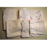 Two boxes of linen to include an embroidered tablecloth, damask tablecloth, embroidered and