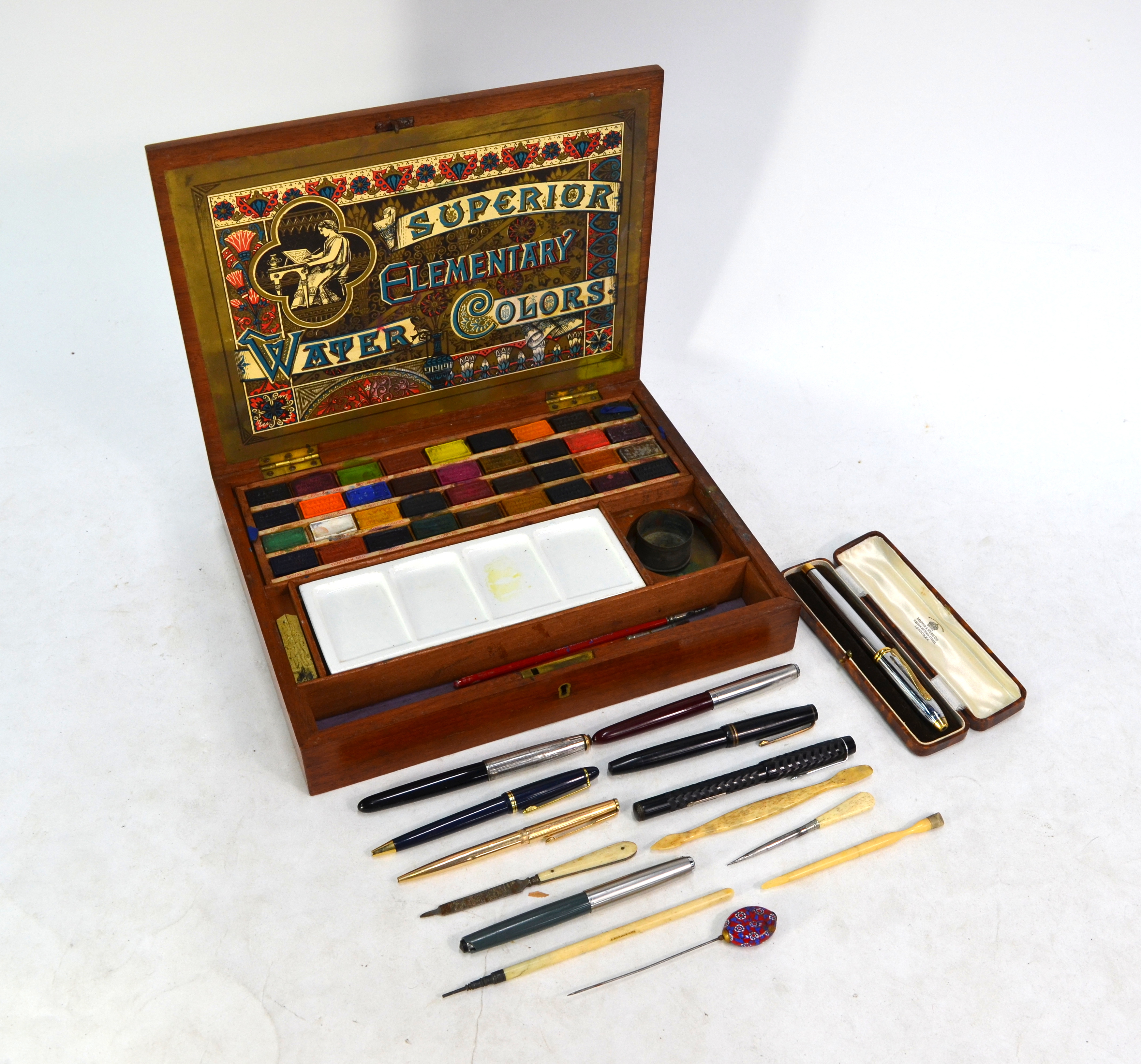 A 19th century teak fitted watercolours box, lithograph paper label within inscribed 'Superior
