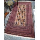 An Afghan Balouch rug, 197 x 103 cm