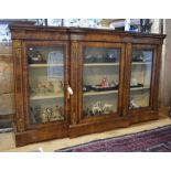 A Victorian inlaid and gilt metal mounted walnut low library bookcase, of breakfront form having