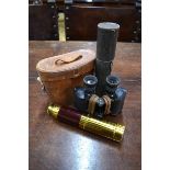 A good quality 19th century lacquered brass three-drawer pocket telescope with mahogany grip, 66.5