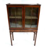 A 19th century mahogany astragal glazed cabinet on stand, 86 x 33 x 135 cm high