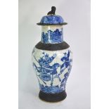 An underglaze blue decorated, Chinese vase with domed cover and Buddhist Lion finial, decorated with