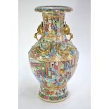 A  Canton famille rose vase, decorated with typical designs of Manchu/Chinese figures; 41 cm high,