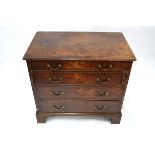 An 18th century mahogany writing chest, having a part fitted secretaire drawer with baize lined