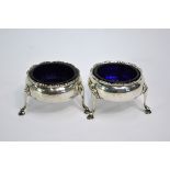 A pair of early George III silver circular open salts on hoof feet, maker not identified, London