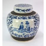 A large underglaze blue decorated Chinese vase with cylindrical cover; decorated with a Scholar