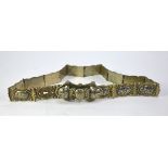 An Armenian Russian or Turkish white metal linked belt 80 cm long, each of the 17 links designed