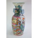 A Canton famille rose vase with trumpet neck; decorated with a narrative scene of Emperors, or other