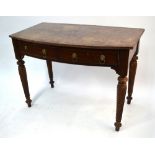 A Victorian mahogany bowfront side table with two frieze drawers, raised on spiral turned legs