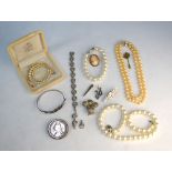 A  mixed lot containing two simulated pearl necklaces, simulated pearl bracelet, marcasite bracelet,