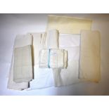 A collection of mostly linen sheets, pillowcases, to/w linen tea tablecloths and set of damask