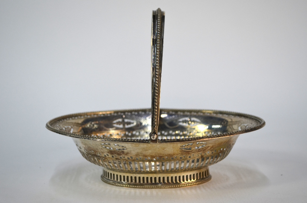 Hester Bateman: an oval pierced bonbon basket in the Adam manner with engraved decoration, beaded - Image 2 of 5