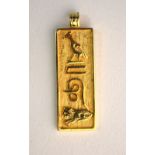 A hieroglyphic style pendant, stamped 585, approx 4.5g