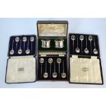 Two cased sets of six coffee spoons with bean finials, to/w a similar electroplated set and a