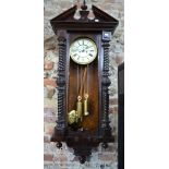 A late 19th century walnut cased eight-day Vienna regulator style wall clock with brass weights a/f,